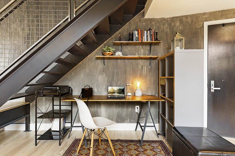 Industrial-Style-Wooden-Top-Study-Table-with-Metal-Legs-under-Single-Flight-Metal-Staircase Design Detail Banner 0