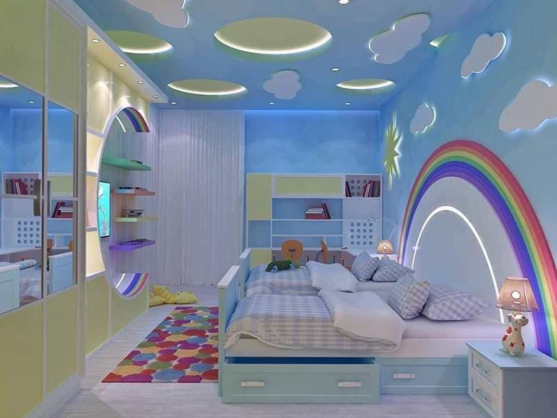 Kids-Bedroom-in-a-Sky-Theme-Includes-Twin-Beds-with-Storage-Side-Table-with-Drawers-Table-Lamp-on-top-of-it Kid’s Bedroom in a Sky Theme Includes Twin Beds with Storage