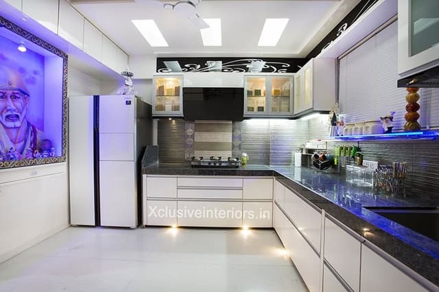 Kitchen-with-L-Shaped-Kitchen-Counter-Black-Granite-Countertop-Lower-Kitchen-Cabinets-with-Aluminum-Profile-Handles-Under-Cabinet-Lights Swiper Content 0