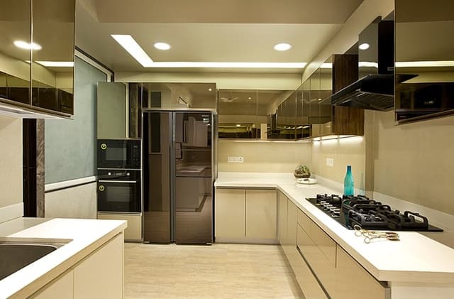 Kitchen-with-L-Shaped-Kitchen-Counter-Solid-White-Kitchen-Countertop-Lower-Kitchen-Cabinets-with-Profile-Handles Swiper Content 0