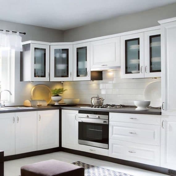 Kitchen-with-L-Shaped-Kitchen-Counter-incorporating-Black-Granite-Countertop-Built-in-Stove-with-Chimney-SS-Single-Bowl-Sink-Lower-Upper-Kitchen-Cabinets-with-Stainless-Steel-Handles. Design Detail Banner 0