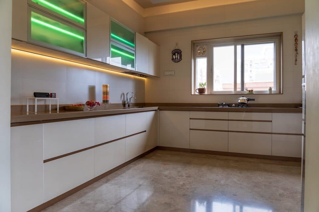 L-Shaped-Kitchen-Platform-with-Sharp-Linear-edges-with-Built-in-Gas-Stove-is-making-it-Modern. Design Detail Banner 0