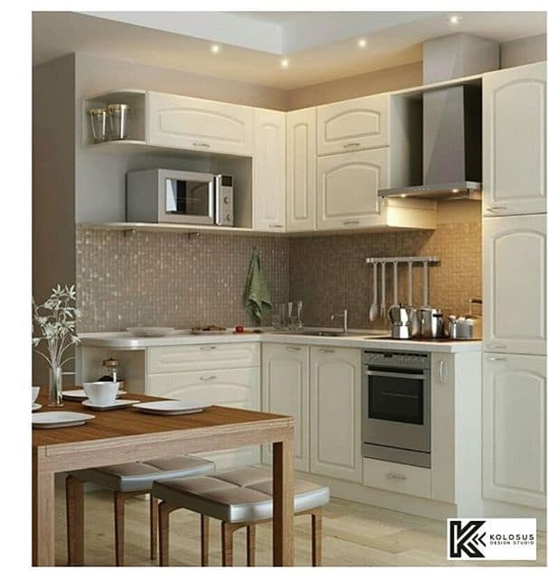 L-Shaped-Kitchen-in-White-Theme-designed-with-Base-Cabinets Swiper Content 0