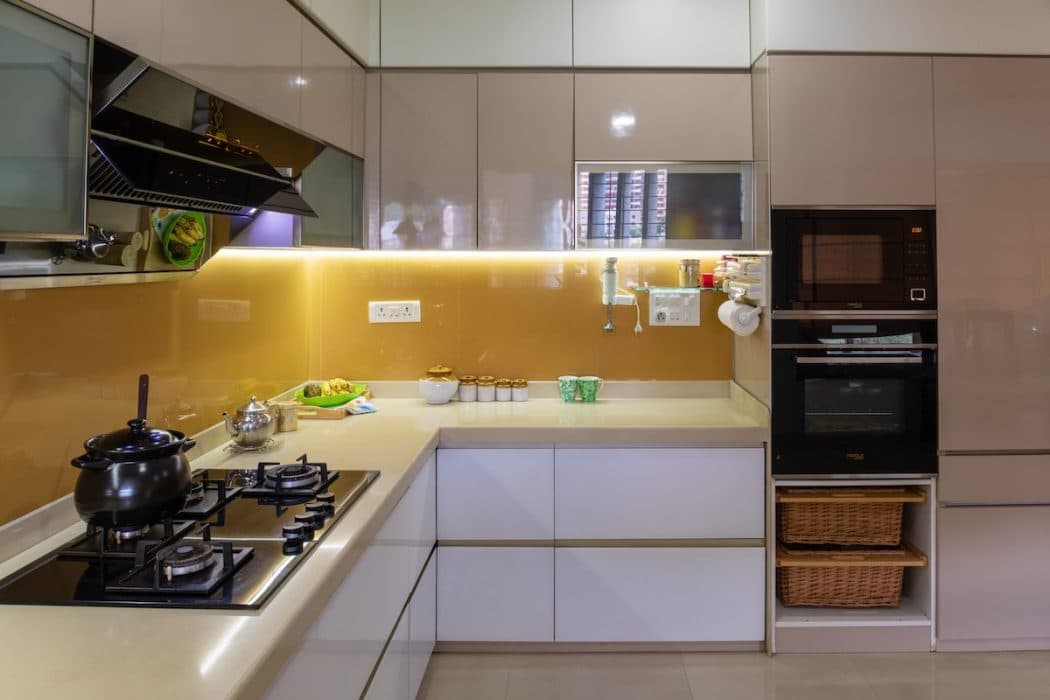 L-Shaped-Modern-Modular-Kitchen-with-a-combination-of-White-Beige-is-making-it-Simple-Elegant.-2 Design Detail Banner 1