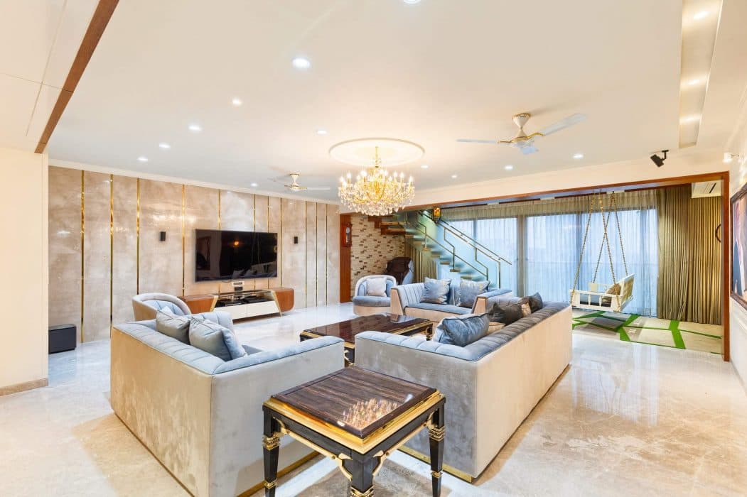 Lavish-Living-Room-comprising-Square-Armed-Sofa-Set-Rectangle-Coffee-Table-Square-End-Table-Side-Nesting-Tables-Sofa-Chairs-Recliner-Under-Canteliver-Staircase-Swing-in-front-of-Stairs-1 Design Detail Banner 2