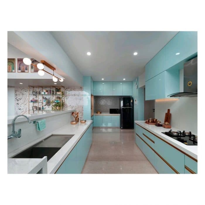 Light-Blue-Coloured-Kitchen-with-Parallel-Kitchen-Counters-White-Marble-Kitchen-Countertop-Lower-Kitchen-Cabinets-with-Profile-Handles. Design Detail Banner 0