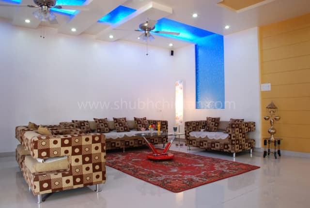 Living-Room-accommodating-Fabric-Upholstered-Square-Armed-Sofa-Set. Swiper Content 0