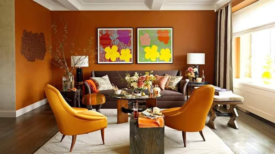 Living-Room-accomodating-Brown-Leather-Upholstered-3-Seater-Sofa-Coffee-Table-with-Glass-Top-Side-Tables-with-Table-Lamps-Flower-Vase-Cushioned-Coffee-Table Design Detail Banner 0