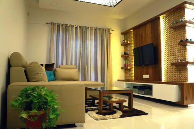 Living-Room-comprising-Fabric-Tufted-L-Shaped-Bolster-Sofa-01 Swiper Content 0