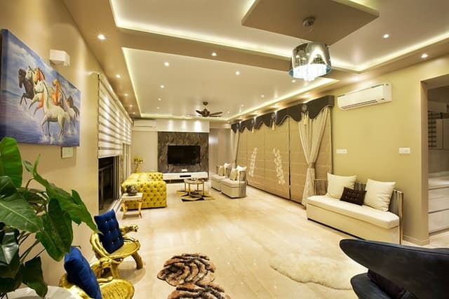 Living-Room-comprising-of-Informal-Seating-Area-with-Low-Heighted-Stools-with-Back-Cushions-Upholstered-2-Seater-Sofa-with-Metal-Tube-Backrest-1-2 Swiper Content 0