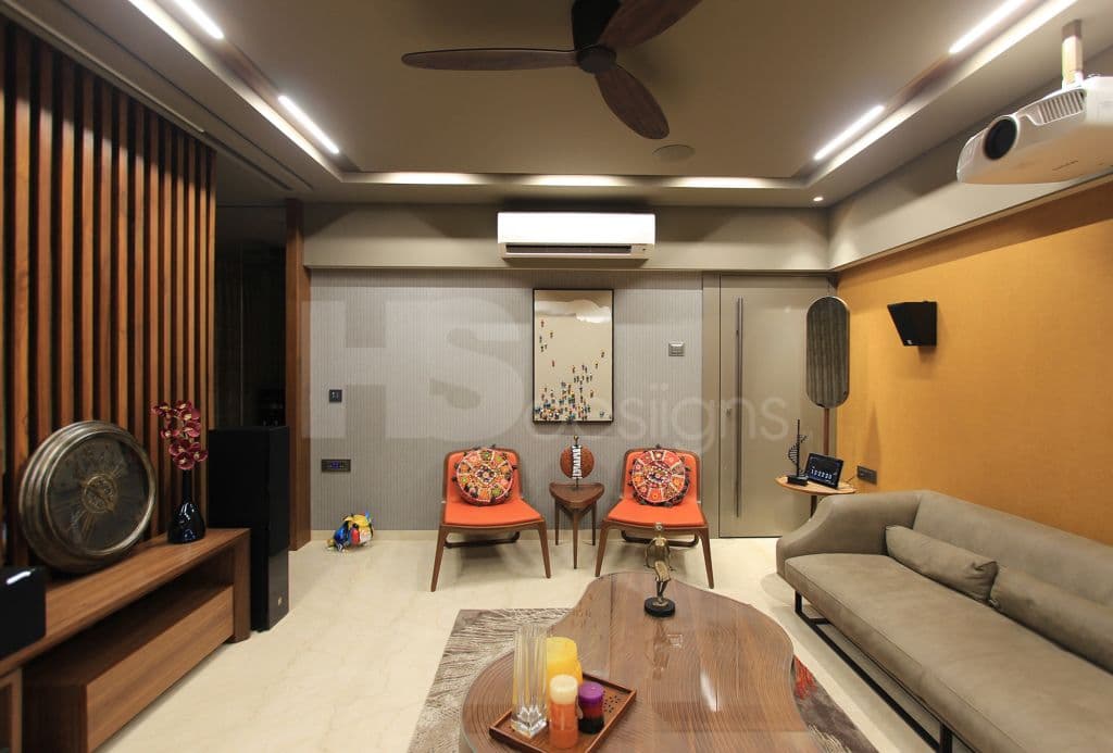 Living-Room-in-Contemporary-Style-with-Grey-Yellow-Walls-accomodating-Sofa-Set-Accent-Armless-Chairs-with-Coffee-Table Design Detail Banner 0