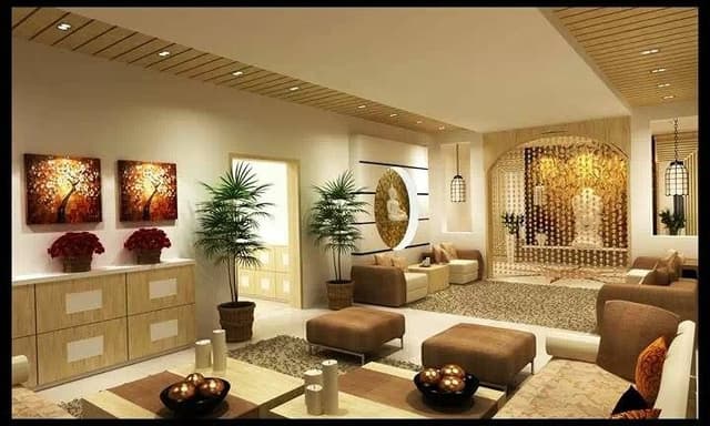 Living-Room-in-Cream-coloured-Theme-designed-with-Sofa-Ottomans-Coffee-Table-Wooden-Storage-Cabinets-with-Wall-Paintings-above-it Swiper Content 0