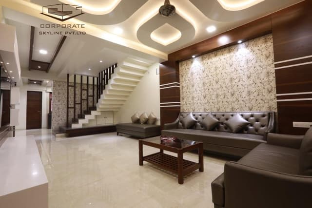 Living-Room-incorporating-Dark-Brown-Leather-Tufted-Upholstered-Sofa-Wooden-Coffee-Table-with-Glass-Top-Wooden-Shelf-below Swiper Content 0