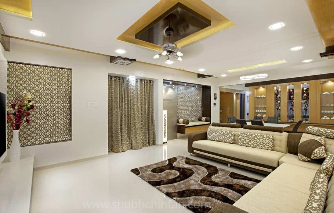 Living-Room-incorporating-Sectional-Sofa-Shaggy-Rug-Open-Plan-Dining-Area-behind-the-Sofa-Wall-mounted-T.V.-Unit-with-a-Linear-Wooden-Shelf Design Detail Banner 1