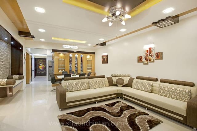 Living-Room-incorporating-Sectional-Sofa-Shaggy-Rug-Open-Plan-Dining-Area-behind-the-Sofa-Wall-mounted-T.V.-Unit-with-a-Linear-Wooden-Shelf. Swiper Content 0