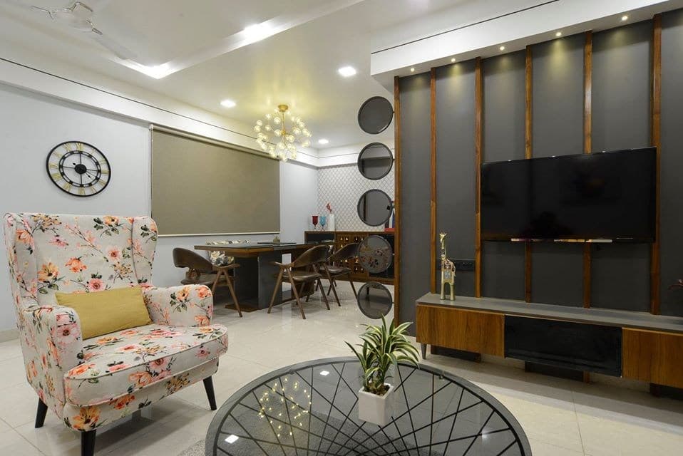 Living-Room-incorporating-Yellow-Coloured-Square-Armed-L-Shaped-Sectional-Sofa-with-Left-Facing-Chaise-Floral-Fabric-Upholstered-Wing-Chair-with-High-Back-3 Design Detail Banner 2