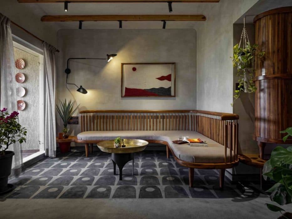 Living-Room-with-Designer-Cushioned-L-Shaped-Wooden-Sofa-having-Wooden-Base-Legs-01 Design Detail Banner 0