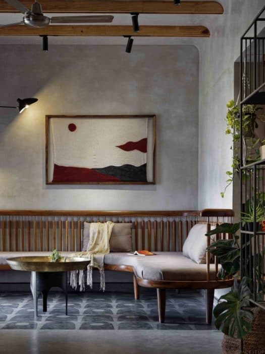 Living-Room-with-Designer-Cushioned-L-Shaped-Wooden-Sofa-having-Wooden-Base-Legs-02 Design Detail Banner 1