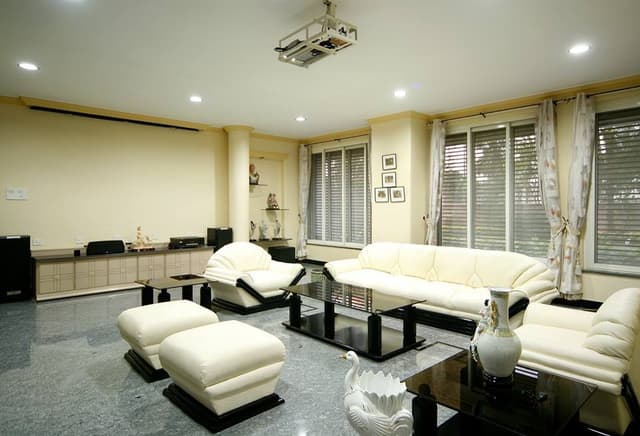 Living-room-comprising-of-Of-White-Leather-Upholstered-Sofa-Set-with-Rolled-Arms-Centre-Side-Tables Swiper Content 0