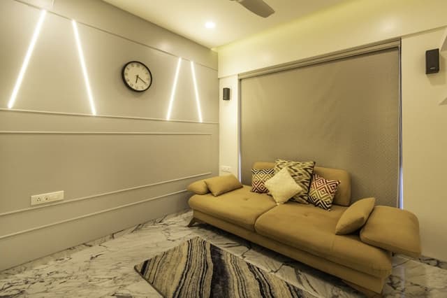 Low-Seater-Upholstered-Sofa-with-Cushions-in-front-of-Wall-with-Window-having-Roller-Blinds Swiper Content 0