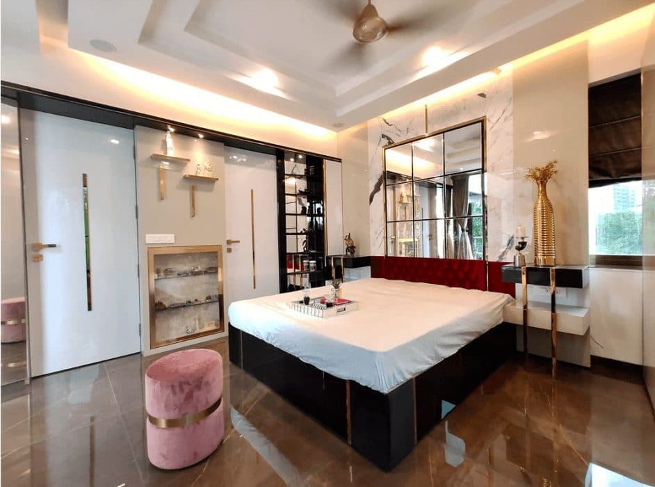 Luxurious-Bedroom-incorporating-Wooden-Double-Bed-with-Storage-Tufted-Red-Velvet-Upholstered-Headboard-Bed-Back-Wall-with-Ceiling-Fitted-Marble-Cladded Design Detail Banner 0