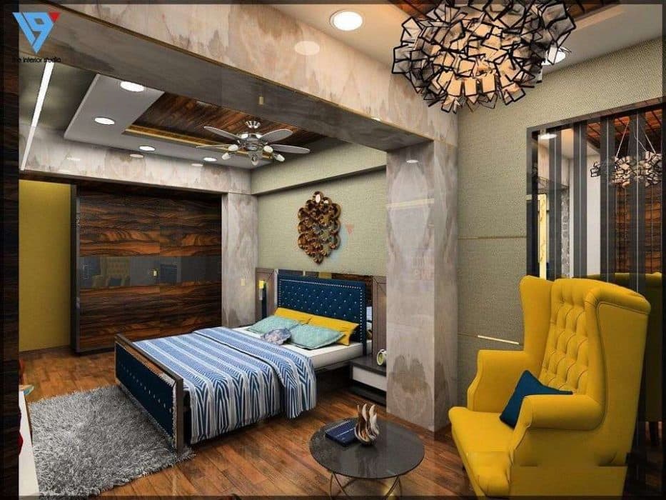 Luxurious-Bedroom-with-Wooden-Flooring-accommodating-Wooden-Double-Bed-Side-Tables-High-Wingback-Tufted-Chair-fin-Yellow-Colour-with-round-Table-1 Design Detail Banner 0