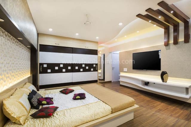 Luxurious-Bedroom-with-Wooden-Flooring-comprises-of-Curved-Raised-Platform-with-Wooden-Flooring-highlighted-by-Cove-Light-3 Swiper Content 2