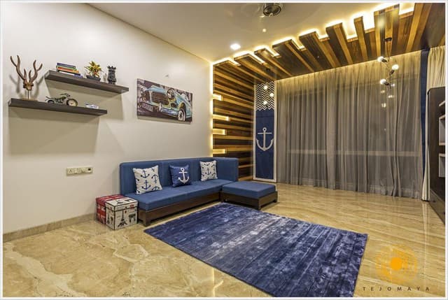 Luxurious-Contemporary-Living-Room-accommodating-Blue-Coloured-Sofa Swiper Content 1