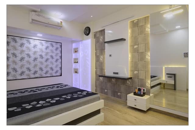 Minimalist-Bedroom-with-Wooden-Double-Bed-with-Storage-below-Wall-Mounted-Side-Tables-Wooden-Headboard-highlighted-with-Cove-Lights Swiper Content 1