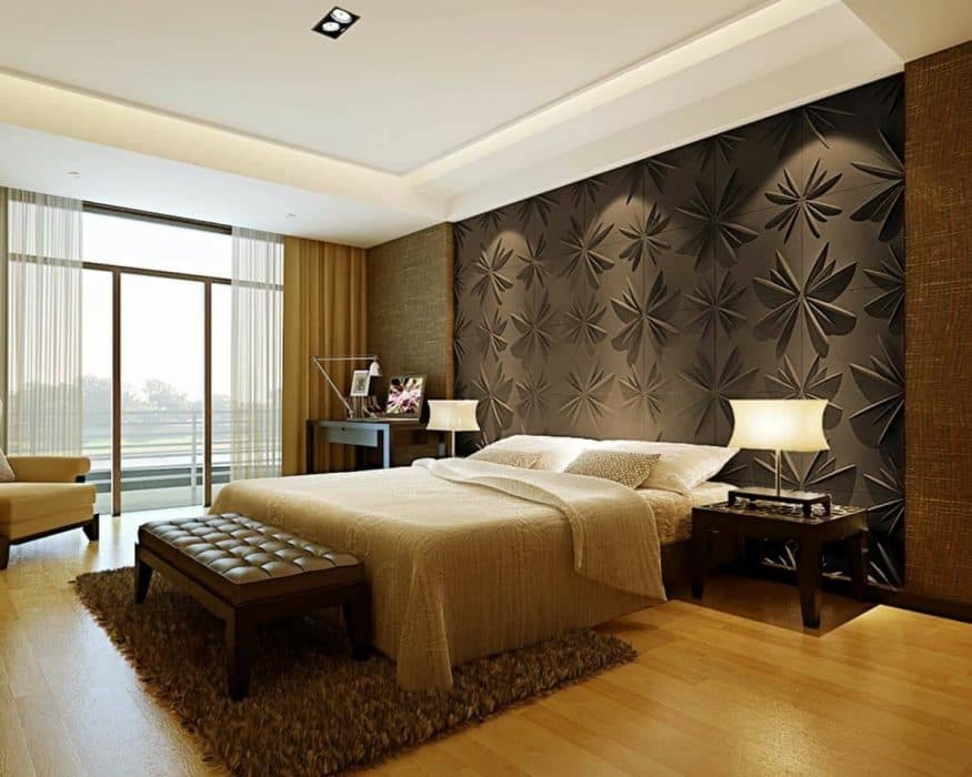 Modern-Bedroom-comprising-Bed-Bed-End-Bench-Side-Tables-with-Table-Lamps-on-it-Study-Table-Sofa-Chair-Rug-French-Windows-with-Transparent-Curtains Design Detail Banner 0