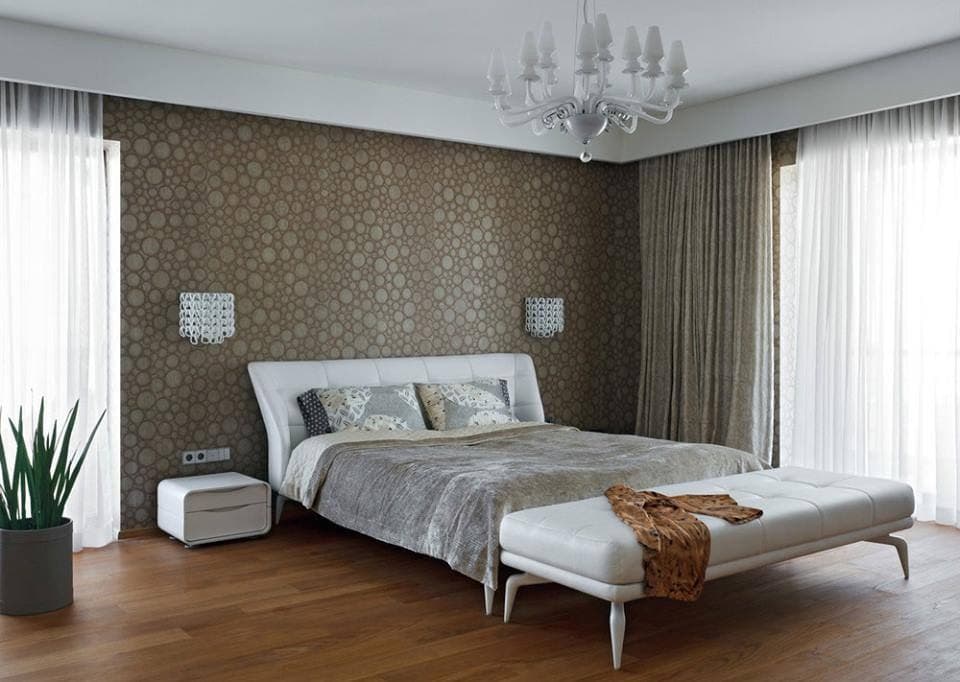 Modern-Bedroom-designed-with-Wooden-Bed-with-Legs-Side-Tables-Bed-End-Bench-Indoor-plants-Textured-Wallpaper-on-Bed-Backwall Design Detail Banner 0