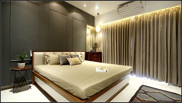Modern-Bedroom-with-Wooden-Double-Bed-with-Upholstered-Headboard-storage-below-Dark-Grey-Coloured-Paneled-Bed-Backwall-with-Beading-1 Modern Bedroom with Wooden Double