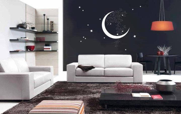 Modern-Living-Room-designed-with-White-Coloured-2-Seater-Square-Armed-Sofa-Set-Low-Heighted-Rectangular-Coffee-Table-placed-on-a-Fur-Rug Design Detail Banner 0