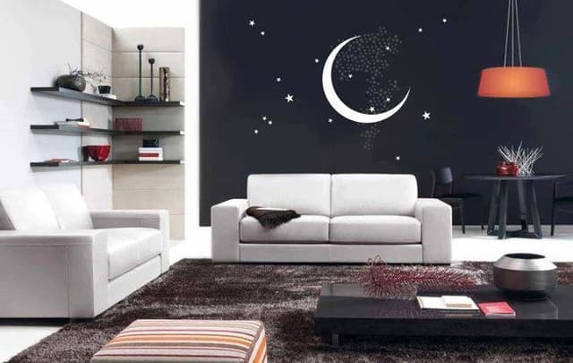 Modern-Living-Room-designed-with-White-Coloured-2-Seater-Square-Armed-Sofa-Set-Low-Heighted-Rectangular-Coffee-Table-placed-on-a-Fur-Rug Swiper Content 0