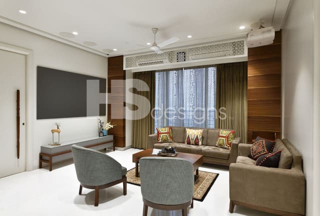 Modern-and-Traditional-Mix-Style-Living-Room-accommodating-Upholstered-Sofa-Set-with-Wooden-Base-Low-Heighted-Upholstered-Sofa-Chairs-Wooden-Center-Table-Modern-Linear-TV-Cabinet. Swiper Content 0
