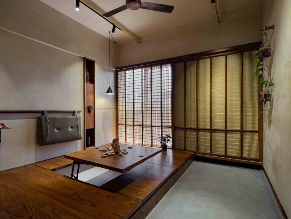 Multipurpose-Room-with-a-Wooden-low-heighted-Seating-Cushioned-Back-hung-on-Wall Design Detail Banner 0