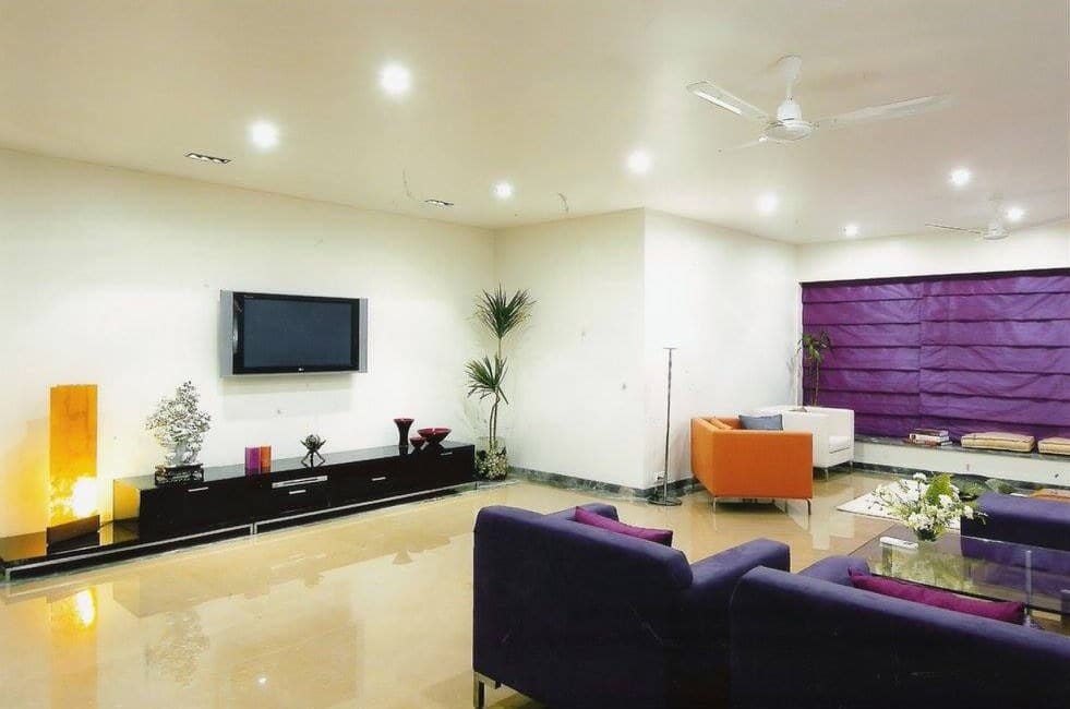 One-Plan-Concept-with-Living-Dining-consisting-Modern-Sectional-Chaise-Sofa-Sofa-Chairs-Center-Table-with-Glasstop-Floor-Lamp-T.V.-Unit-Decor-Wall-2 Design Detail Banner 1