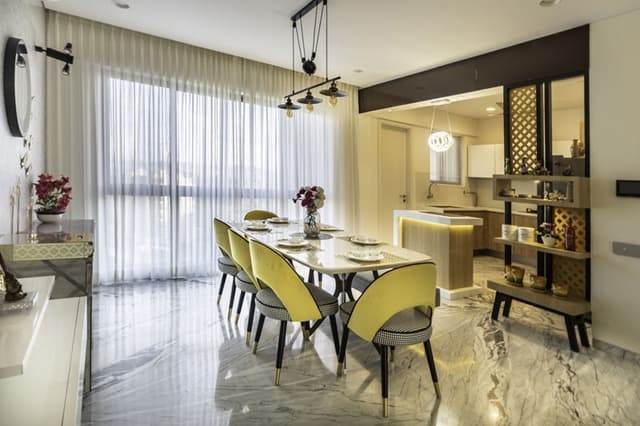 Open-Concept-Dining-Living-Room-comprises-of-8-Seater-Dining-Table-with-White-Marble-Tabletop-2 Swiper Content 1