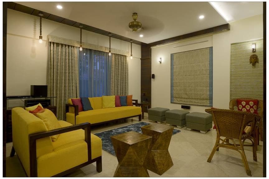 Open-Concept-Foyer-Living-Room-incorporates-Foyer-with-Wooden-Door-Floor-Mounted-Wooden-Chest-of-Drawers-Backlit-False-Ceiling-continuing-in-Wall Design Detail Banner 1