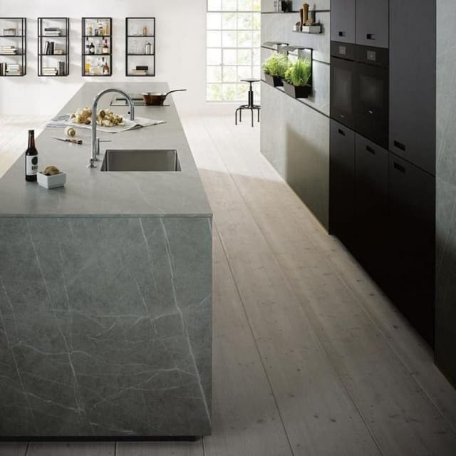 Open-Concept-Industrial-Style-Kitchen-Dining-with-Wooden-Flooring-comprises-of-Linear-Kitchen-Counter-cum-Island Swiper Content 1