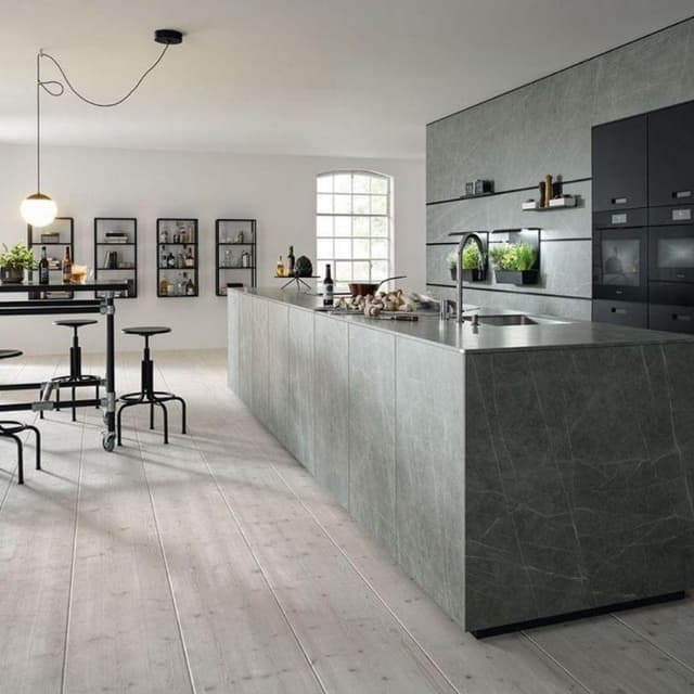 Open-Concept-Industrial-Style-Kitchen-Dining-with-Wooden-Flooring-comprises-of-Linear-Kitchen-Counter-cum-Island. Swiper Content 0