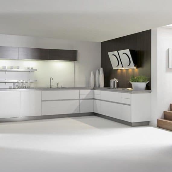 Open-Concept-Kitchen-with-L-Shaped-Kitchen-Counter-incorporating-Grey-Counter-Top-Built-in-Stove-with-Slant-Chimney-Lower-Upper-Kitchen-Cabinets-with-Aluminum-Profile-Handles Swiper Content 0