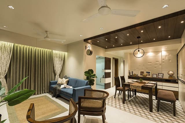 Open-Concept-Living-Dining-Room-comprises-of-Blue-Shaded-Square-Armed-Upholstered-Linear-Sofa-on-Wooden-Base-4-1 Swiper Content 3