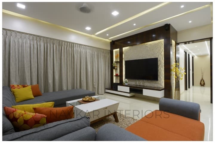 Open-Concept-Living-Dining-Room-comprises-of-Dark-Grey-Shaded-Tufted-Upholstered-L-Shaped-Sectional-Sofa-with-Right-Side-Facing-Chaise-3 Design Detail Banner 2