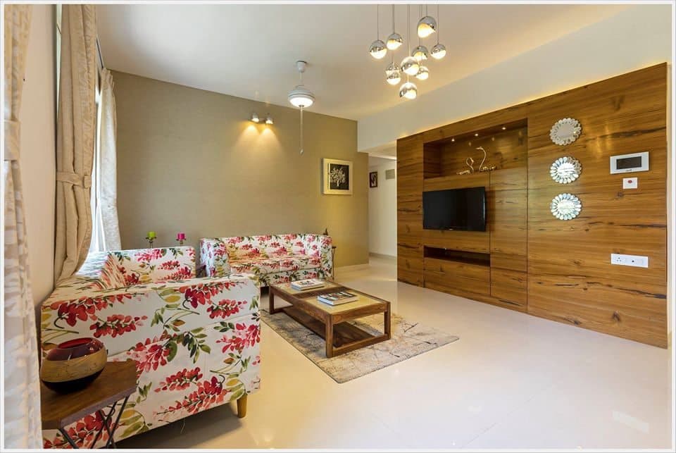 Open-Concept-Living-Dining-Room-comprises-of-Floral-Fabric-Upholstered-Square-Armed-Sofas-3 Design Detail Banner 2