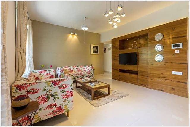 Open-Concept-Living-Dining-Room-comprises-of-Floral-Fabric-Upholstered-Square-Armed-Sofas-3 Swiper Content 2