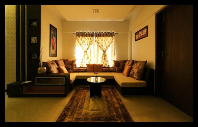 Open-Concept-Living-Dining-Room-with-a-C-Shaped-Wooden-Custom-made-Sofa-with-One-Side-Attached-End-Table-Cushions-2 Open Concept Living Dining Room