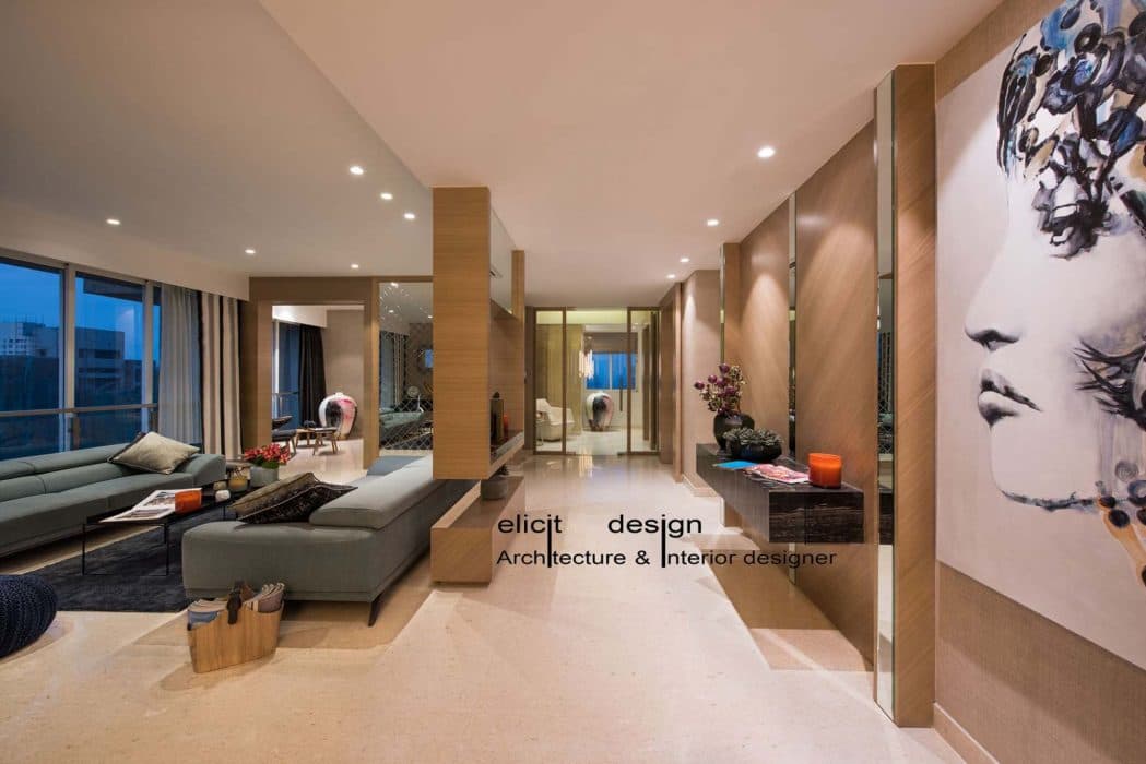 Open-Concept-Luxurious-Living-and-Dining-Room-with-Upholstered-Sofa-with-Adjustable-Headrest-and-Wooden-Legs-Coffee-Table-with-Metal-Frame-Rug-Blue-Pouf-TV-Unit-with-Wooden-Wall-Panelling Open Concept Luxurious Living and Dining Room