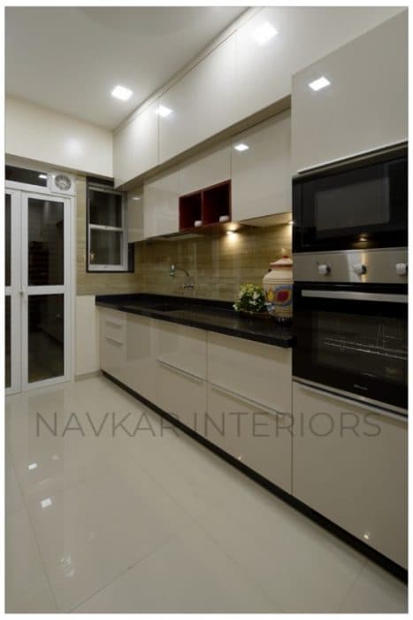 Parallel-Kitchen-Galley-Kitchen-Corridor-Kitchen-in-Cream-Theme-designed-with-Base-Cabinets. Swiper Content 1