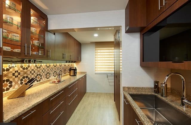 Parallel-Kitchen-with-Granite-Countertop-Lower-Kitchen-Cabinets-with-Stainless-Steel-Handles-Ceiling-Fitted-Upper-Kitchen-Cabinets-with-Wooden-Glass-Door Swiper Content 0